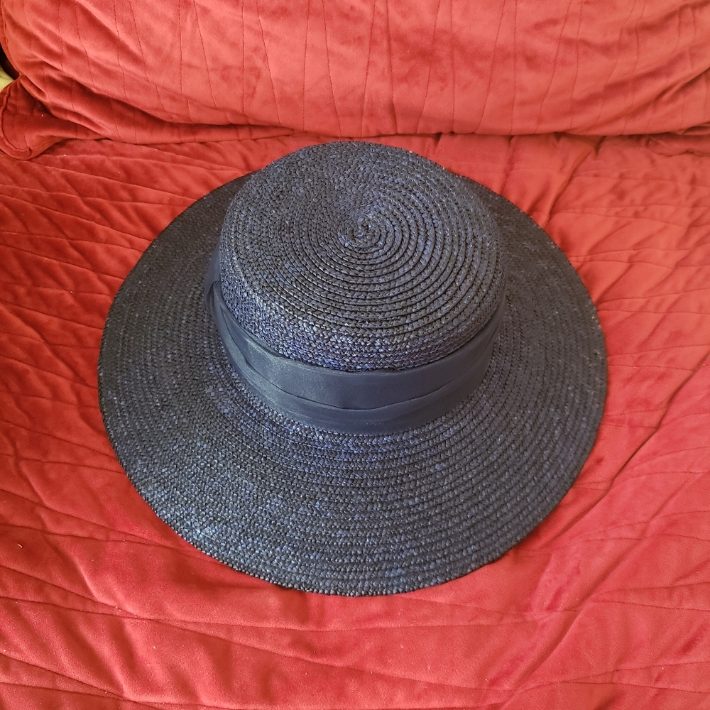 Daniele Meucci semi wide brim navy hat.